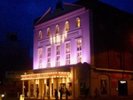 The Old Vic lit up for a performance of The Entertainer